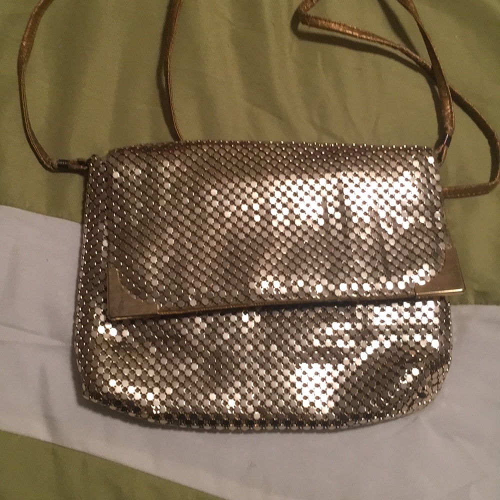 Vintage gold metal cross body purse